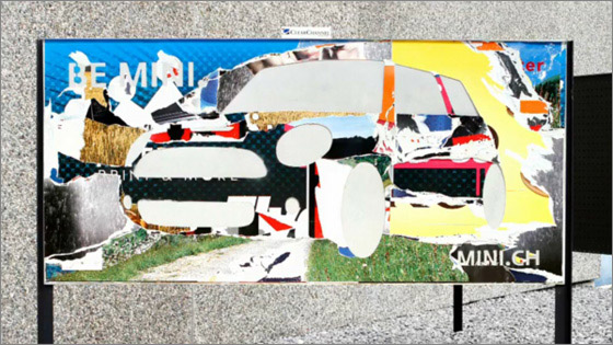 ミニクーパーの屋外広告。前の広告主のポスターを切り抜きミニを表現。広告のリサイクルで環境性能をPRしたようです。<スイス>